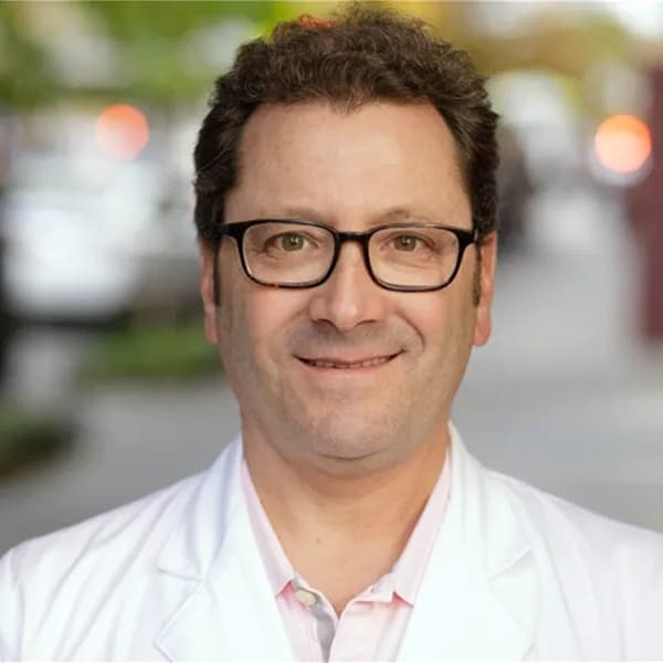 Mitchell J. Mandel, M.D., F.A.A.D.